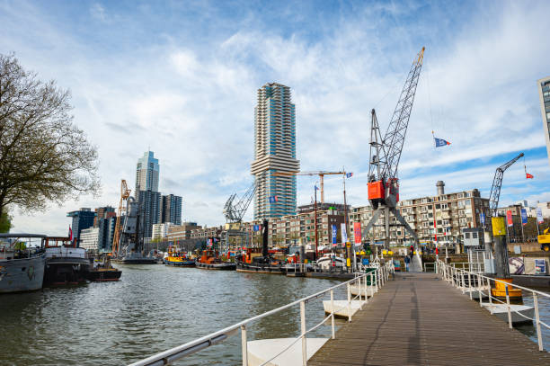 Rotterdam, Netherlands - April 9, 2024: Scenic view of harbor ¨Leuvehaven¨ in the center of Rotterdam.