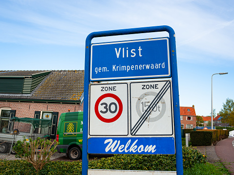 Vlist, Netherlands - April 22, 2024: Location sign of the small village of Vlist, municipality of Krimpenerwaard in the western part of The Netherlands.
