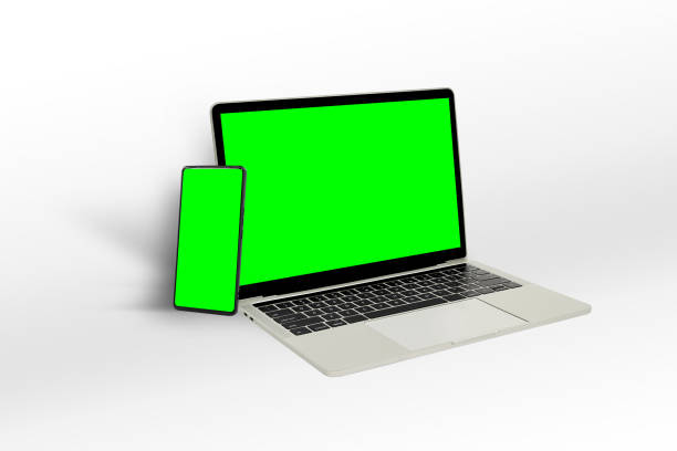 istock Isolated Devices Mockup. Green screen laptop and green screen mobile phone displayed on white background. 2149936986