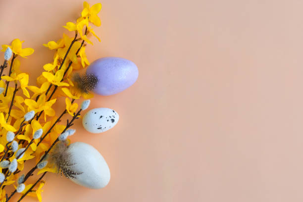 istock Composition of flowers, bunnies and Easter eggs on a pastel background 2149937771