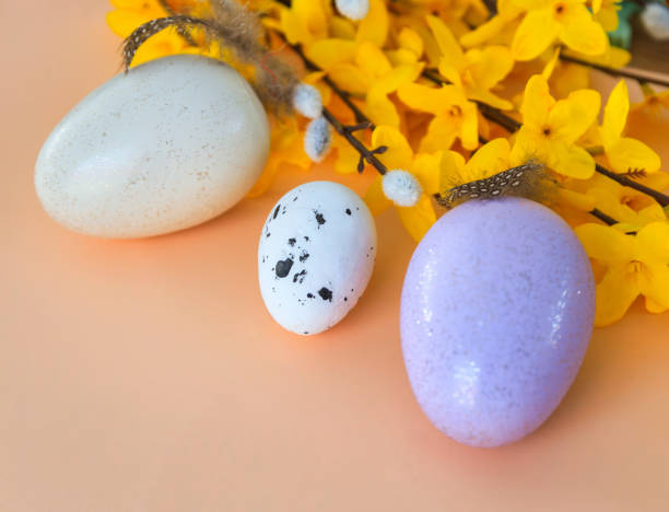 istock Composition of flowers and Easter eggs on a pastel background 2149937803