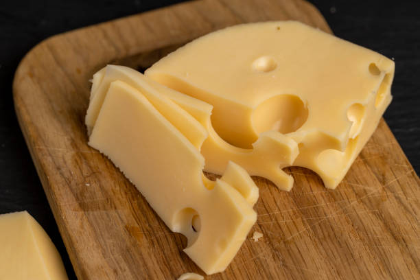 istock cream cheese with holes on the table 2149939608