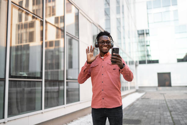 istock African-American talking on a video call via mobile phone 2149940113
