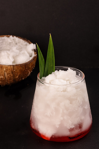 Es Kelapa Kopyor. Iced Dessert Drink Made of Natural Coconut Curd and Pandan Syrup.