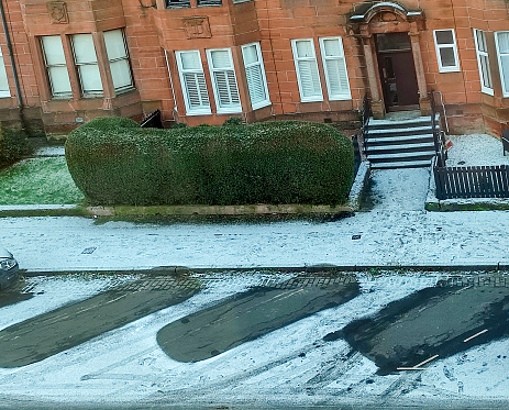 Cold wheather and snow at street of glasgow Scotland England