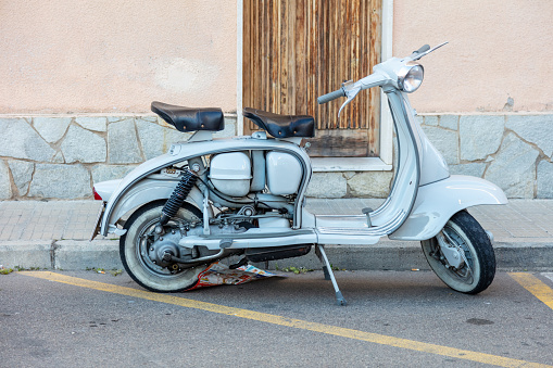 old scooter on the street, a very popular means of transport in Italy