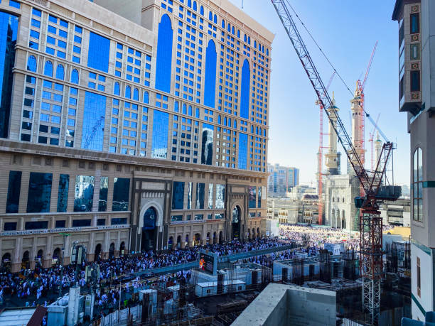 View of pilgrims infront of the Masjidil Haram in Mecca during hajj and umra. Masjidil Haram in Mecca is the holiest and most visited mosque for all Muslims