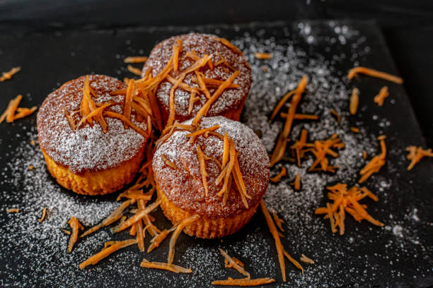 istock Carrot  muffins on dark background 2149953418