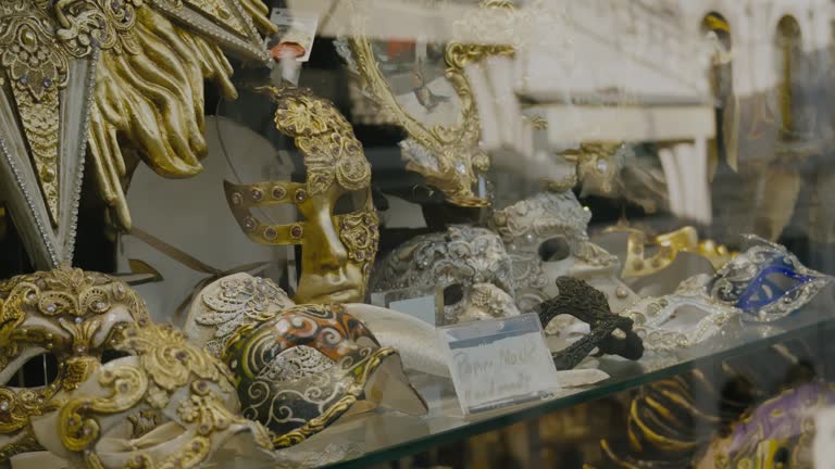 Ornate masks in Venetian shop display