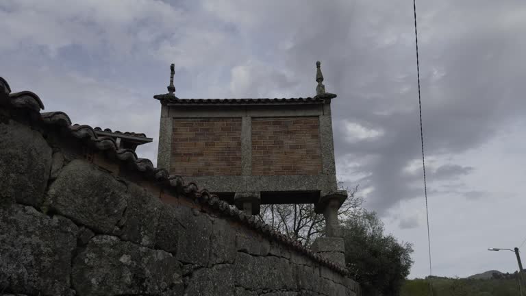 Traditional Galician Granary On A Cloudy Day In Pereiro De Aguiar, Spain
