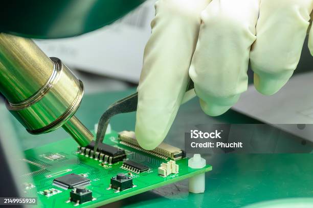Hand Soldering Process Close Up Scene The Soldering Process For Assembly The Computer Chip ...