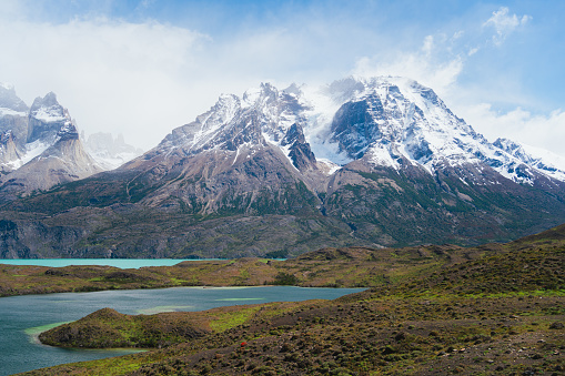 Beautiful landscape view of snowed mountain in NordenskjÃ¶ld lake in Torres del Paine park in Chile