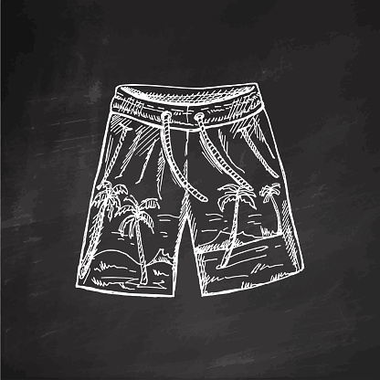Hand-drawn sketch of beach shorts. Summer accessory isolated on chalkboard background. Vintage vector illustration in engraving style.