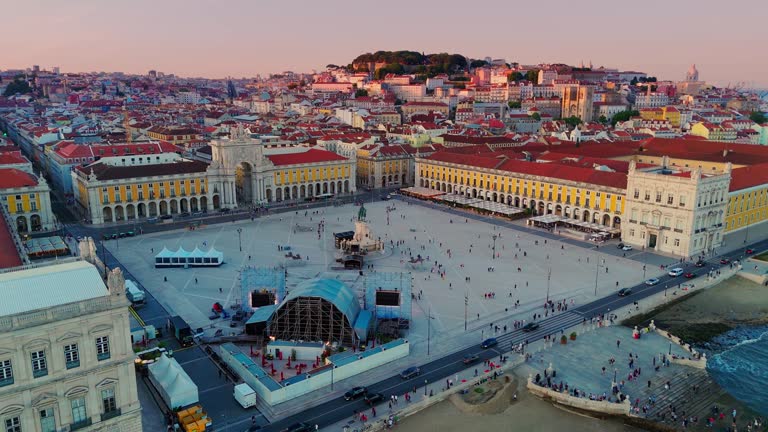 Aerial view of Lisbon, Portugal. View of famous Augusta Arch, Commercial square, and Tagus river at sunset.Horizontal shot