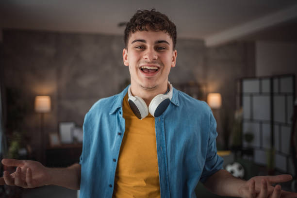 istock A cheerful teenager makes a video for his vlog 2149960077