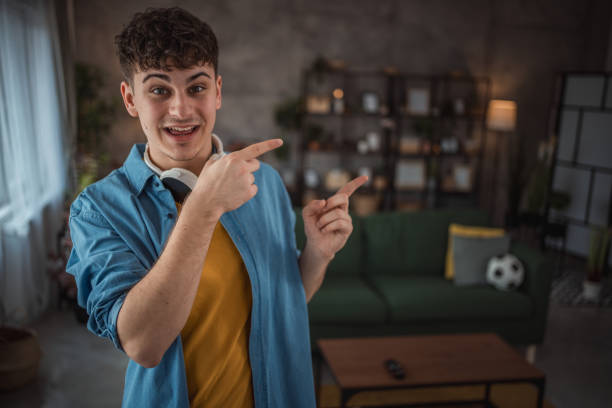 istock A cheerful teenager makes a video for his vlog 2149960085