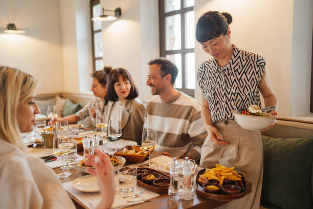 istock Group of friends 's having a brunch in a restaurant 2149961688