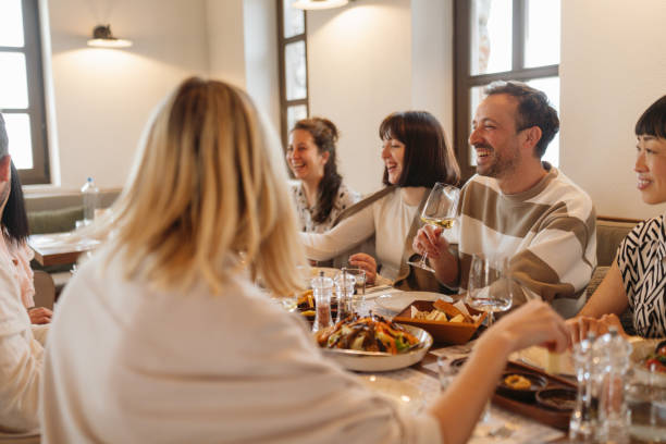 istock Group of friends 's having a brunch in a restaurant 2149961705