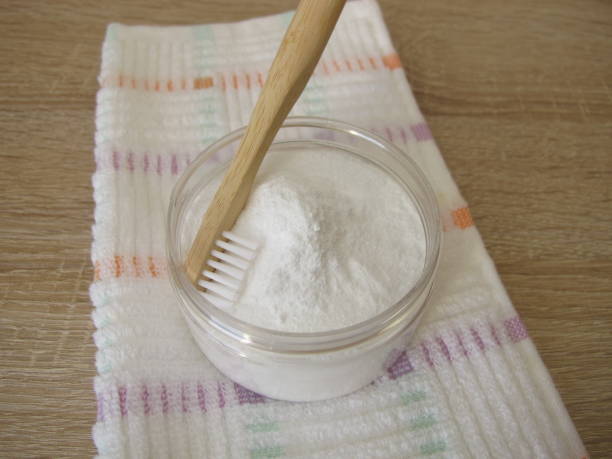 istock Tooth powder and a wooden toothbrush 2149963842