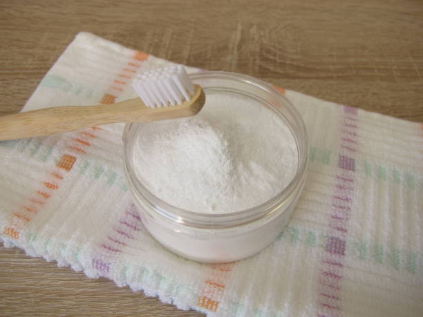istock Tooth powder and a wooden toothbrush 2149963848