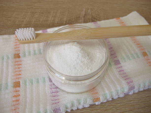 istock Tooth powder and a wooden toothbrush 2149963854