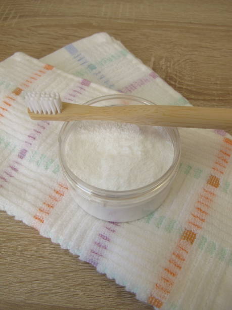 istock Tooth powder and a wooden toothbrush 2149963862