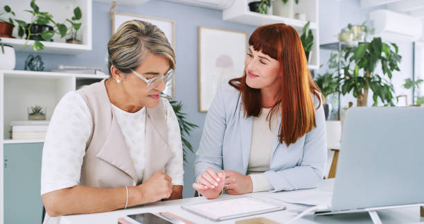 istock Designer, women and happy with tablet in office for project management, creative brainstorming and business. Employees, teamwork and idea sharing for collaboration with tech for design reviews. 2149965910