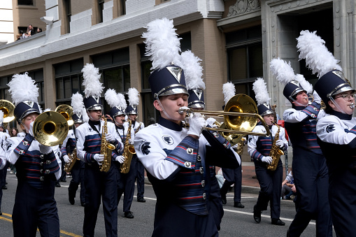 Norfolk, Virginia USA:  April 20th 2024:  During the 75th annual NATO parade high school marching bands from across the United States and abroad march in the parade.