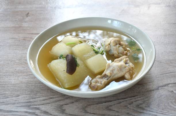 istock boiled winter melon drumstick chicken with mushroom soup 2149967023