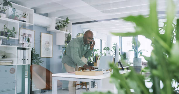 istock Businessman, office and laptop or creative phone call, interior design and manager checking calendar or email. Conversation, appointment for consultation on smartphone, planning and designer working 2149968402