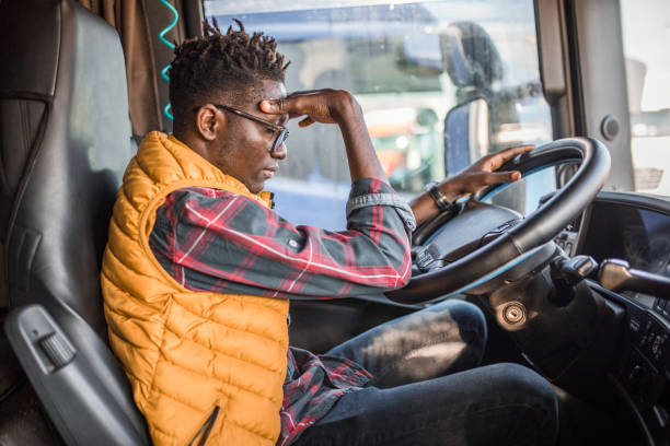 istock A male trucker has a headache after working extra hours 2149968823