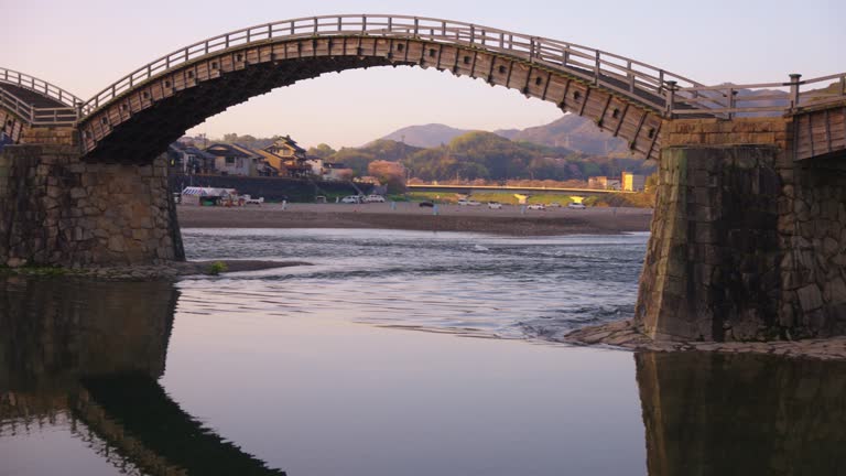 Kintai Kyo Arch Bridge Reflecting in Nishiki River, Early Morning Establishing Shot