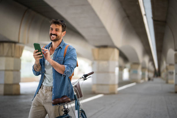 istock Man With Bicycle and Using Smartphone Outdoors. 2149969777