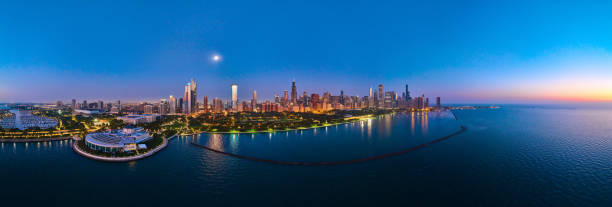 istock Aerial Chicago Skyline at Blue Hour with Waterfront Reflections Panorama 2149973484