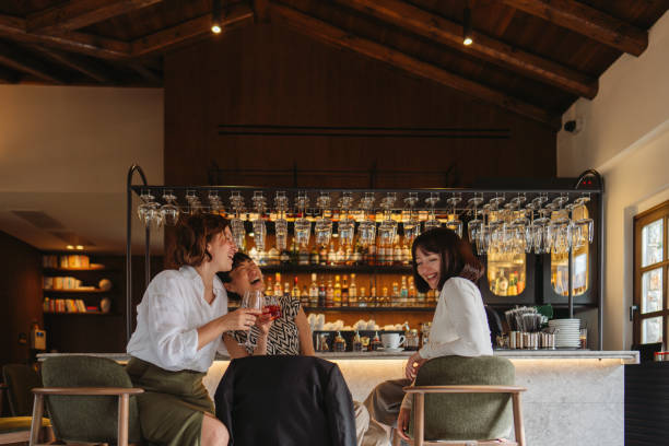 istock Female friends in a bar 2149974294