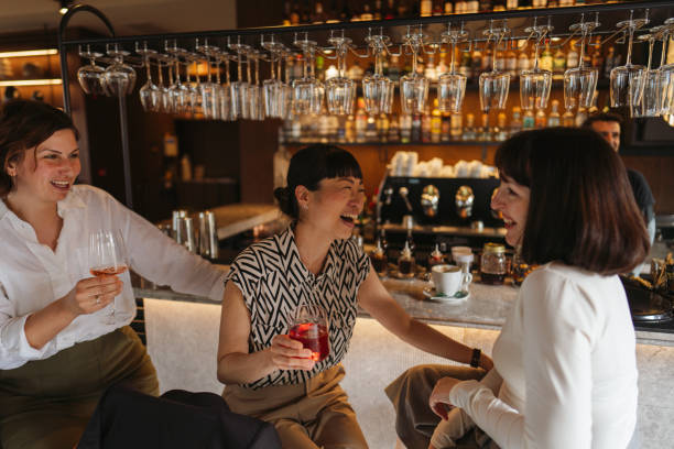 istock Female friends in a bar 2149974344