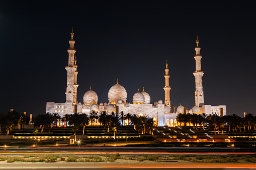 Abu Dhabi, UAE - April 23, 2024: Time lapse of Grand Sheikh Zayed Mosque at night