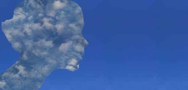 istock Panoramic sky with a female face in profile formed by clouds   In the background a cloudless sky 2149977675