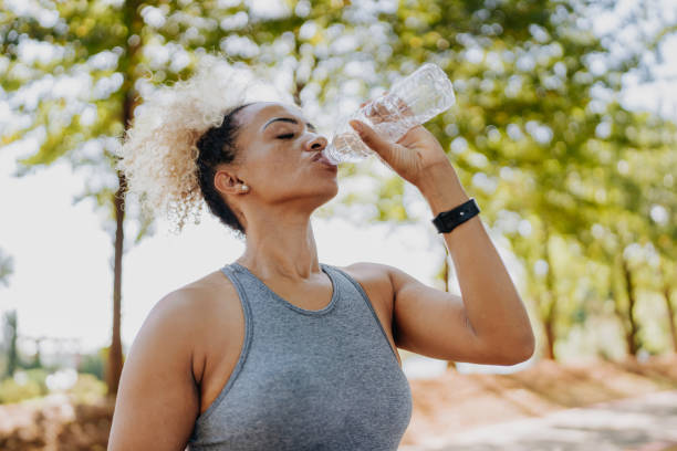 istock Fitness runner woman drinking water 2149981799