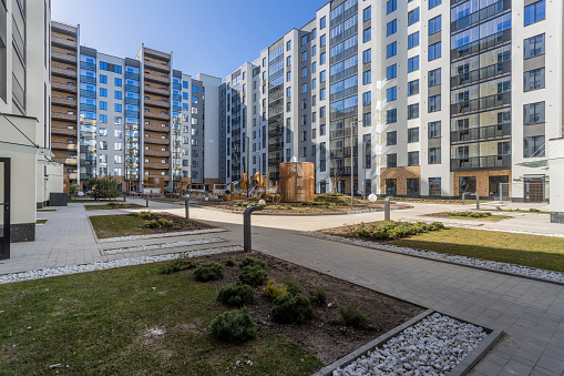Residential area of ​​the city of St. Petersburg, courtyard of multi-storey high-rise buildings on a sunny day