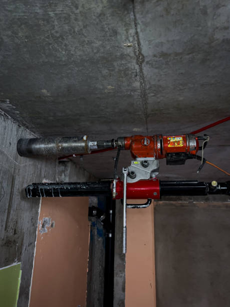 istock Huge cement drill machine in action high in the ceiling 2149984576