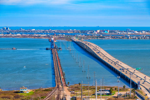 The Galveston Causeway linking Galveston Island with the Houston metropolitan area shot via helicopter from an altitude of about 600 feet on a sunny afternoon