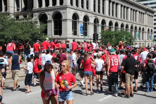 Blackhawks fans celebrate Stanley's Cup win in Chicago. 2 million people celebrated the trophy in Chicago streets during team parade.