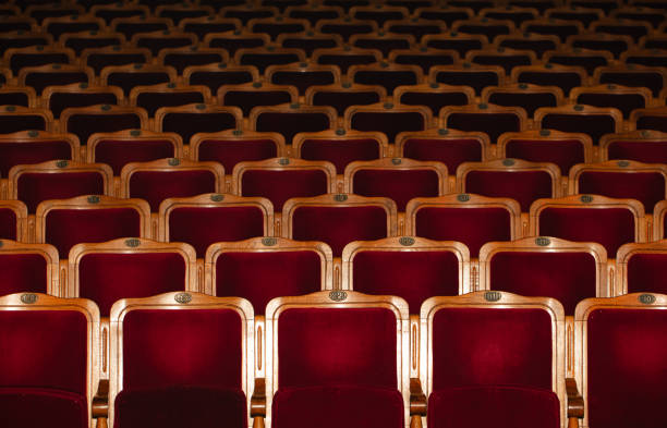 istock Row of red seats in theatre 2149996708