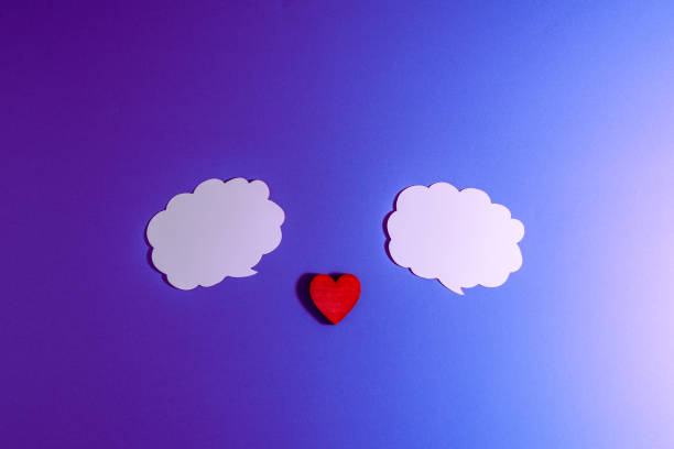 istock White clouds,heart for Valentine's day concept.Communication red heart between two clouds. Purple,veri peri background.Place for your text. Copy space. 2149999014
