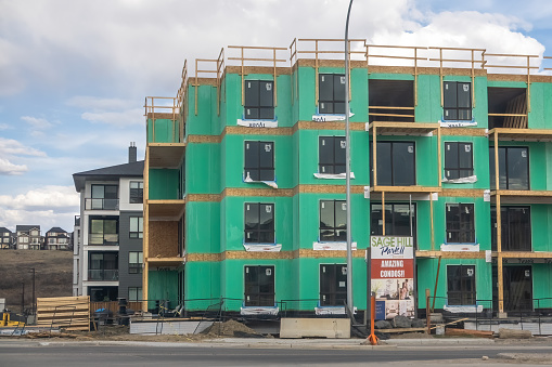 Calgary, Alberta, Canada. Apr 23, 2024. Underway construction for a new apartment complex.