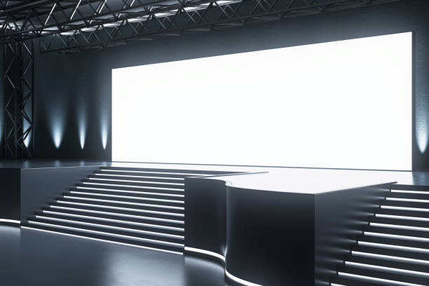 istock Sleek conference hall with spotlighted stage and audience seating. Corporate event space. 3D Rendering 2149999848