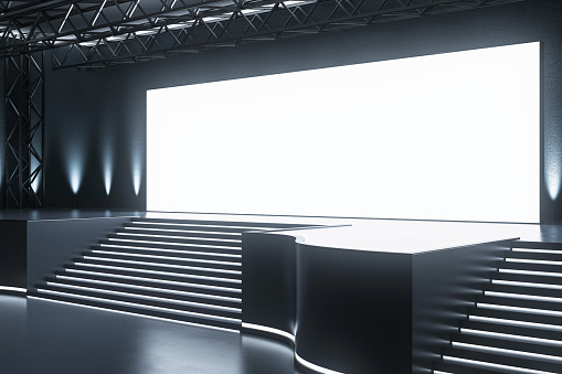 Sleek conference hall with spotlighted stage and audience seating. Corporate event space. 3D Rendering