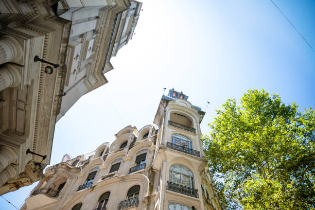 low angle view on historic residential architecture in Buenos Aires against blue sky