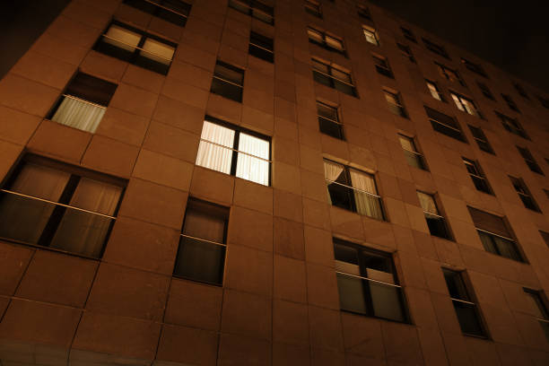 istock Modern apartment building facade at night 2150001272